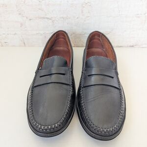 Tod's Elegant Black Leather Loafers